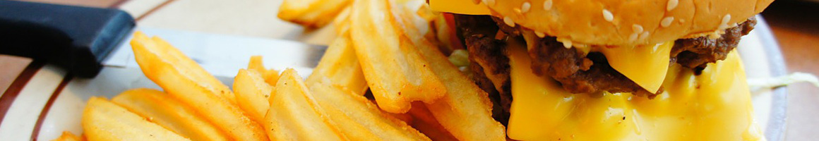 Eating Burger at Louie M's Burgerlust restaurant in Omaha, NE.